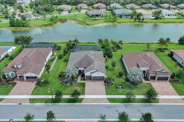 birds eye view of property featuring a water view