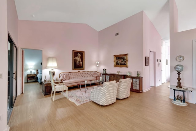 8282 Mooring Cir, Boynton Beach, FL 33472 - bedroom with high vaulted ceiling and light wood finished floors