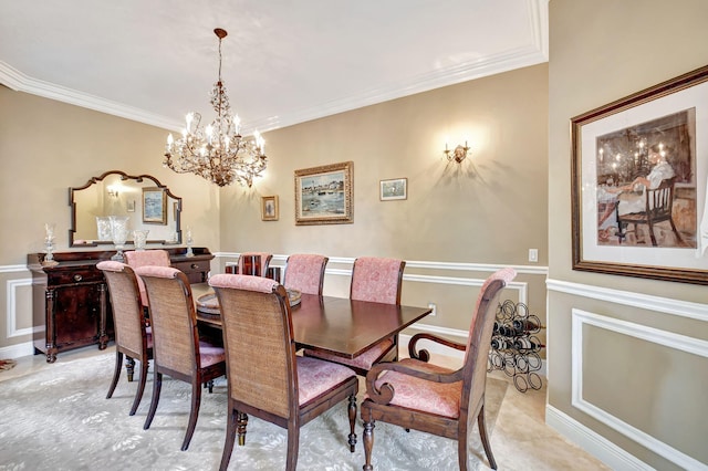 dining space with crown molding and a chandelier