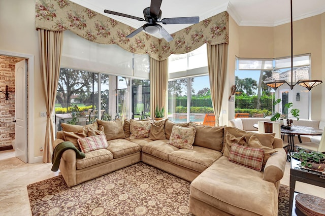 sunroom / solarium with ceiling fan