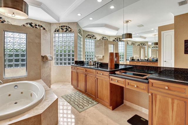 bathroom featuring vanity, crown molding, plenty of natural light, and tiled bath