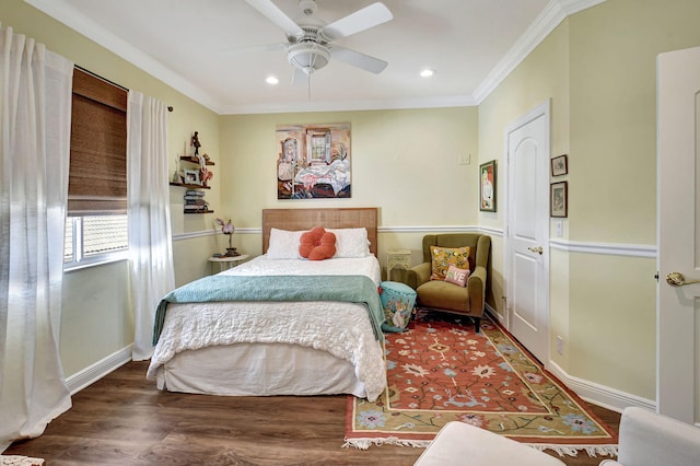 bedroom featuring ceiling fan, crown molding, and hardwood / wood-style floors