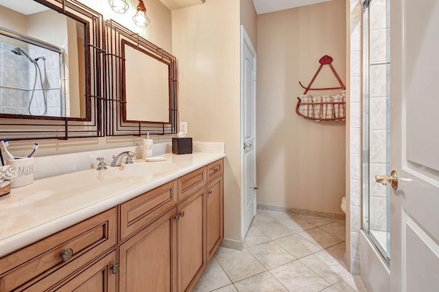 bathroom featuring vanity, toilet, and tile patterned floors