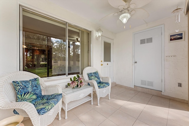 interior space featuring ceiling fan