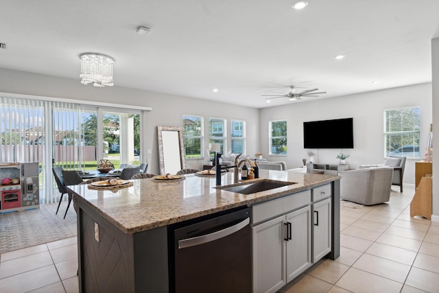 19535 Split Rail Run, Loxahatchee, FL 33470 - kitchen featuring dishwasher, a sink, open floor plan, light tile patterned floors, and recessed lighting