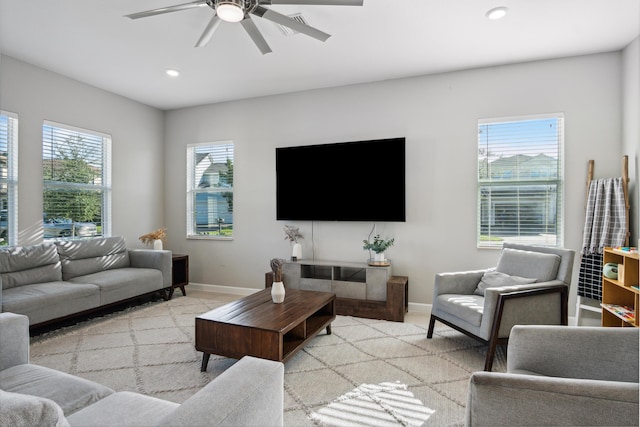 19535 Split Rail Run, Loxahatchee, FL 33470 - living area featuring a ceiling fan, baseboards, recessed lighting, and light colored carpet