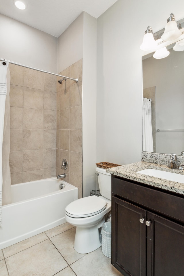 full bathroom with tile patterned floors, vanity, toilet, and shower / bathtub combination with curtain