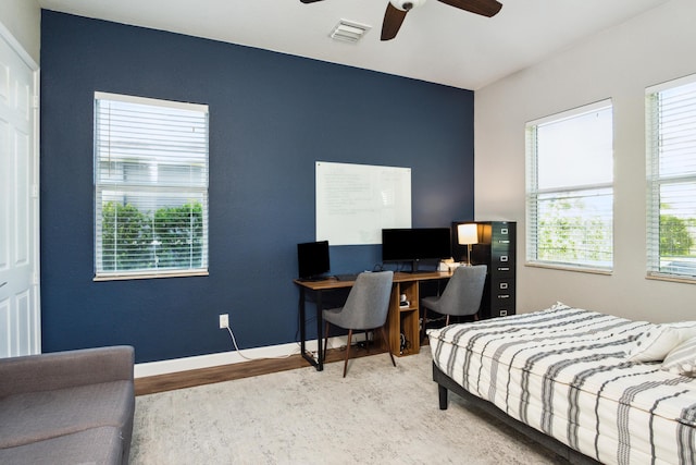 19535 Split Rail Run, Loxahatchee, FL 33470 - bedroom with wood finished floors, a desk, baseboards, and a ceiling fan