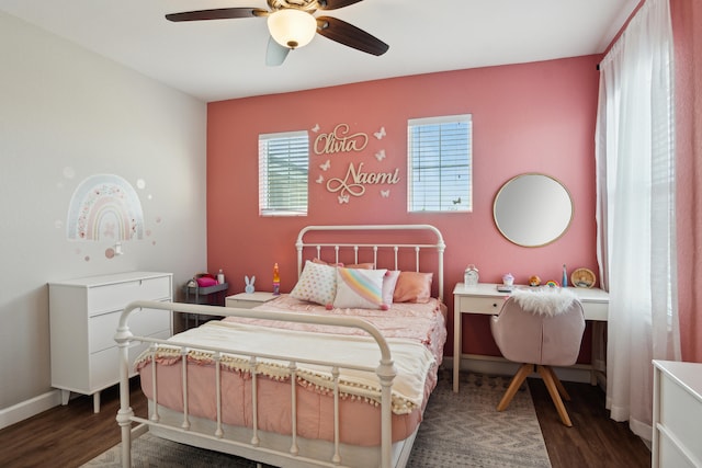 bedroom featuring ceiling fan and dark hardwood / wood-style floors