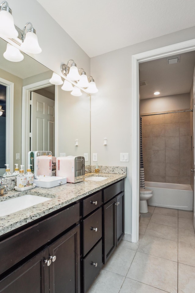 19535 Split Rail Run, Loxahatchee, FL 33470 - full bathroom featuring double vanity, tile patterned floors, toilet, and tub / shower combination