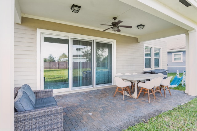 view of patio / terrace featuring ceiling fan