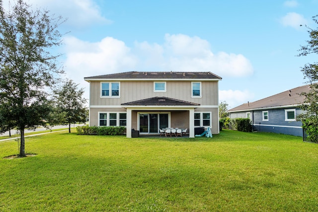 19535 Split Rail Run, Loxahatchee, FL 33470 - rear view of house featuring a yard