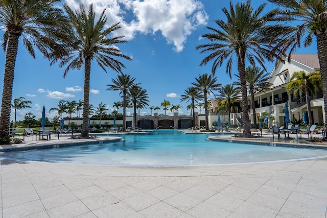 view of pool featuring a patio