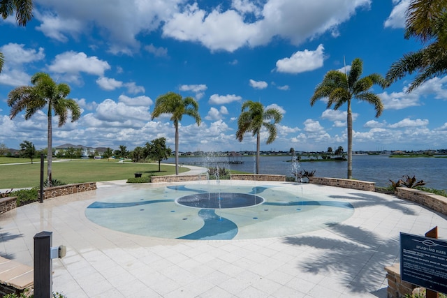 19535 Split Rail Run, Loxahatchee, FL 33470 - view of swimming pool featuring a water view and a yard