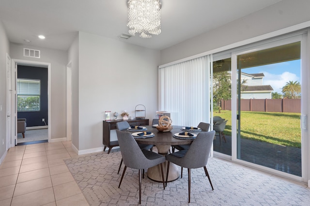 19535 Split Rail Run, Loxahatchee, FL 33470 - dining space with a chandelier, light tile patterned flooring, baseboards, and recessed lighting