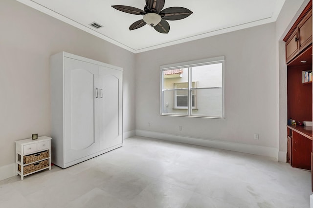 unfurnished bedroom featuring ornamental molding and ceiling fan