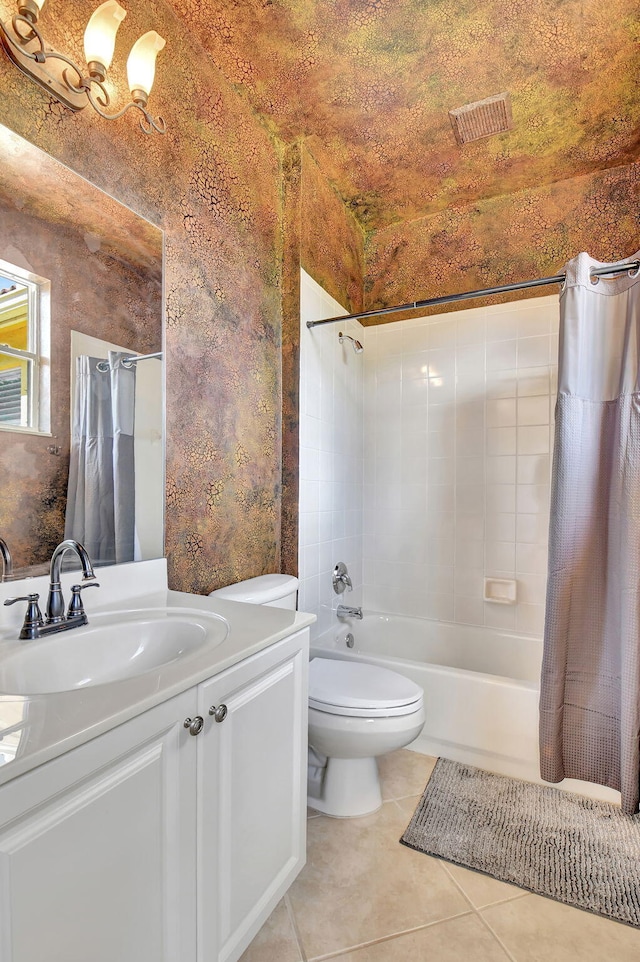 full bathroom with vanity, toilet, shower / bathtub combination with curtain, and tile patterned flooring