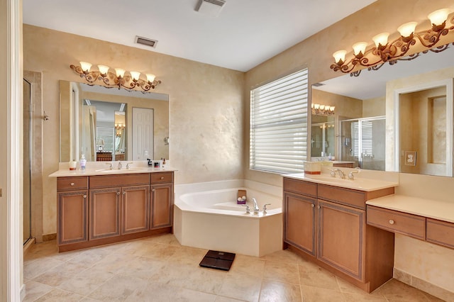 bathroom with vanity, plus walk in shower, and tile patterned flooring