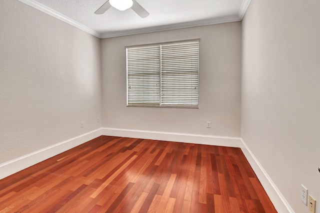 unfurnished room with ornamental molding, hardwood / wood-style floors, and ceiling fan