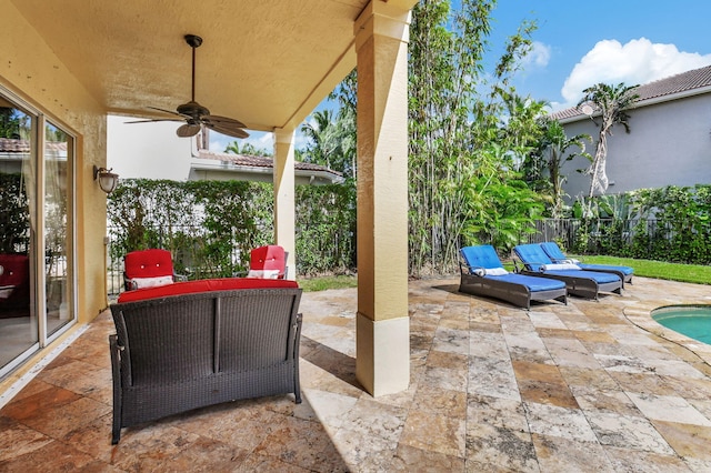 view of patio / terrace featuring ceiling fan