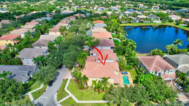 birds eye view of property featuring a water view