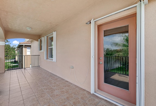 doorway to property with a balcony