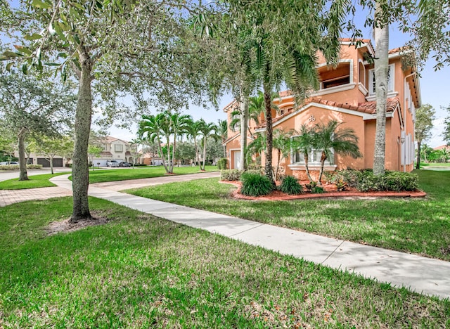 surrounding community featuring a yard