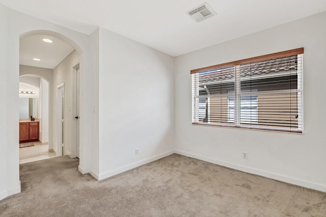 view of carpeted spare room