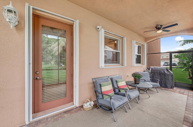 view of patio / terrace featuring ceiling fan