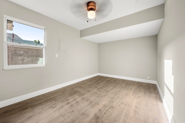 additional living space featuring ceiling fan and light hardwood / wood-style floors