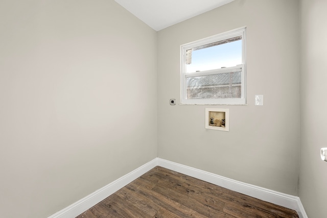 washroom featuring dark hardwood / wood-style floors, hookup for a washing machine, and hookup for an electric dryer