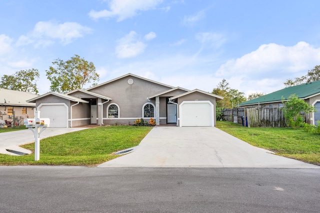 ranch-style house with a garage and a front yard