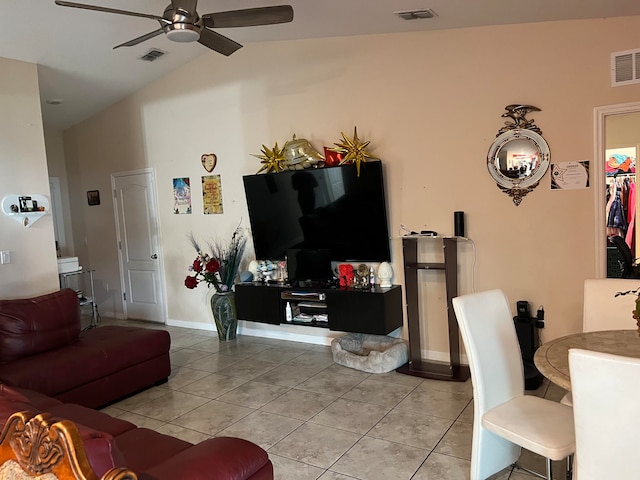 tiled living room with vaulted ceiling and ceiling fan