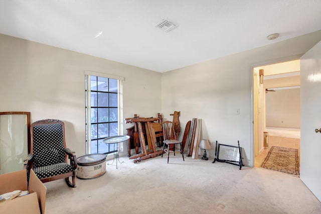 sitting room with light carpet