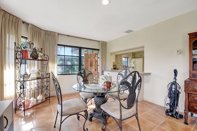 view of tiled dining space