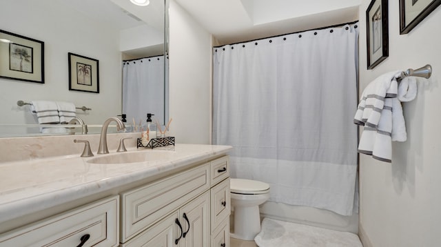 full bathroom with tile patterned floors, vanity, toilet, and shower / bath combo