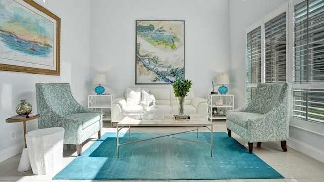 living area featuring tile patterned flooring and a wealth of natural light