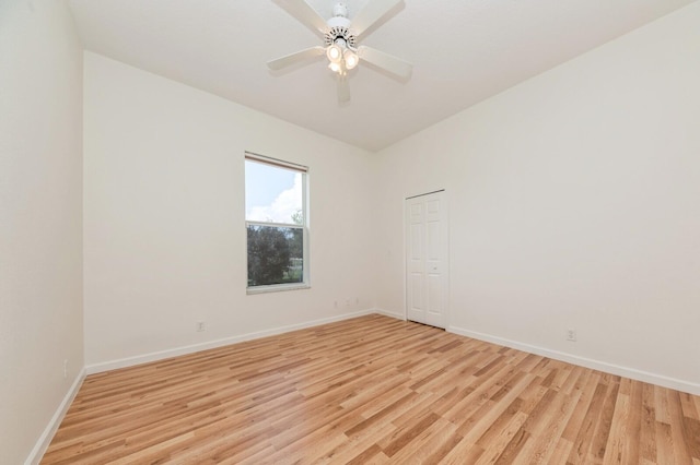 empty room featuring light hardwood / wood-style floors and ceiling fan