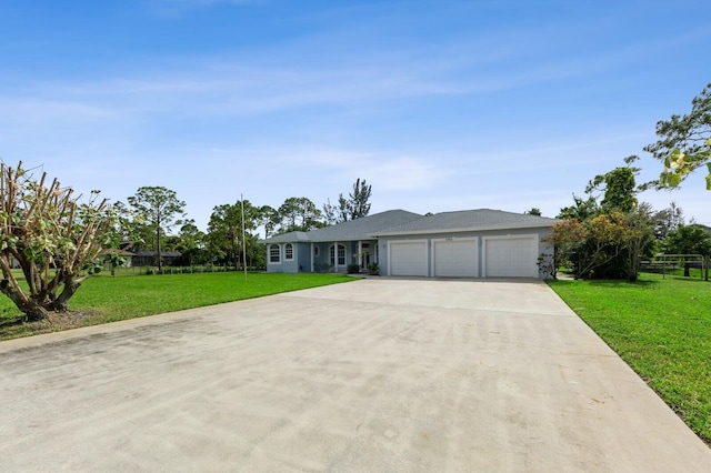 view of front facade featuring a front lawn and a garage