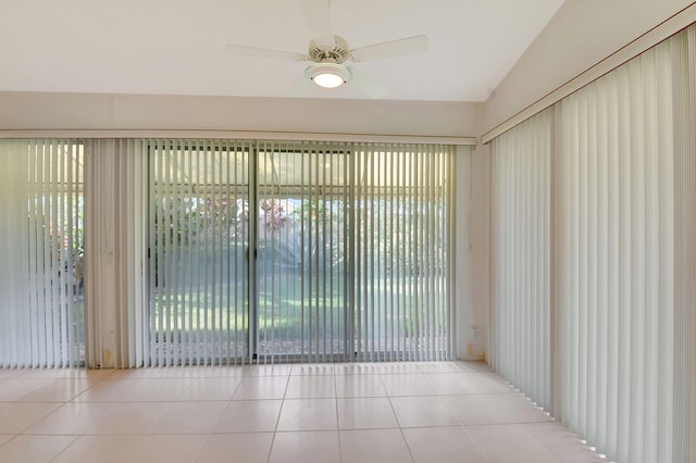 interior space with ceiling fan