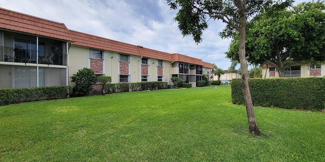 view of community featuring a yard