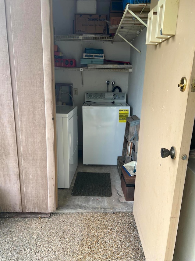 laundry area with washer and clothes dryer