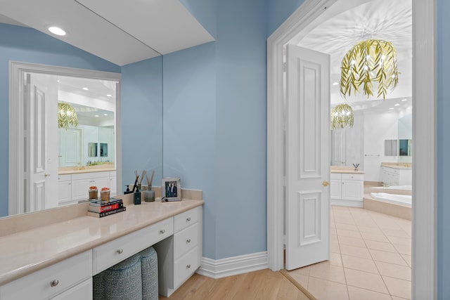 bathroom featuring vanity and tile patterned flooring