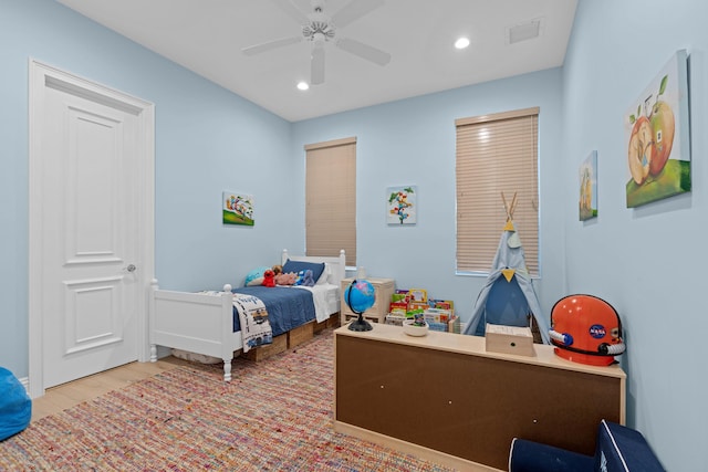 bedroom featuring ceiling fan and wood-type flooring