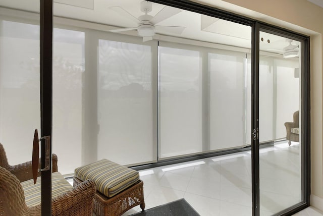 sunroom / solarium with ceiling fan