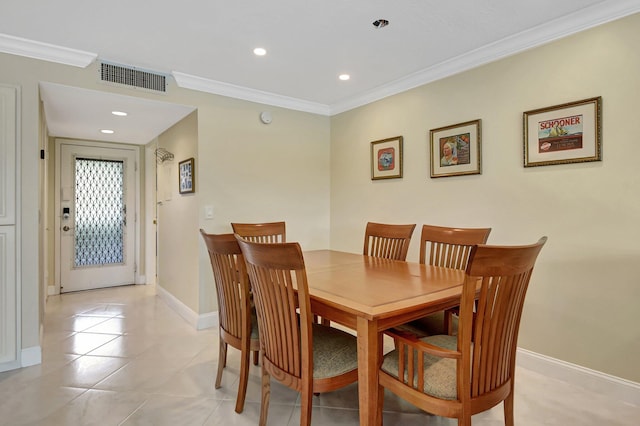 tiled dining space with ornamental molding