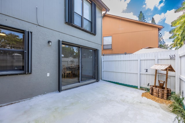 view of patio / terrace with fence