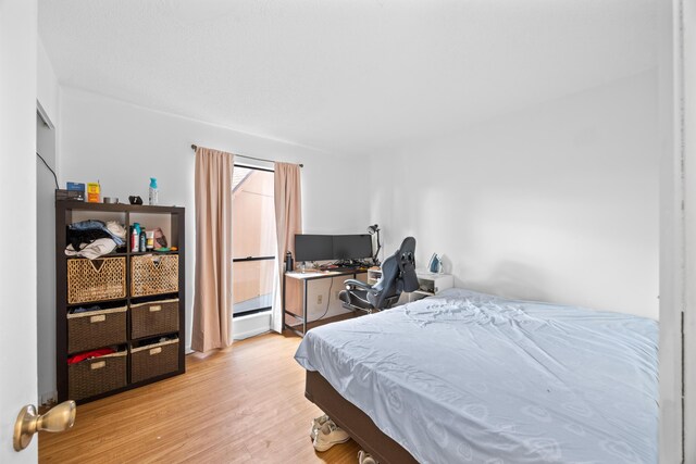 bedroom with light wood-style flooring