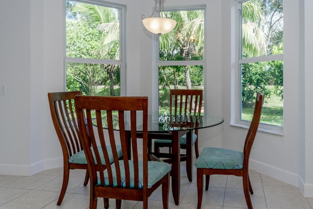 5353 Grand Banks Blvd, Greenacres, FL 33463 - dining space featuring baseboards and tile patterned flooring