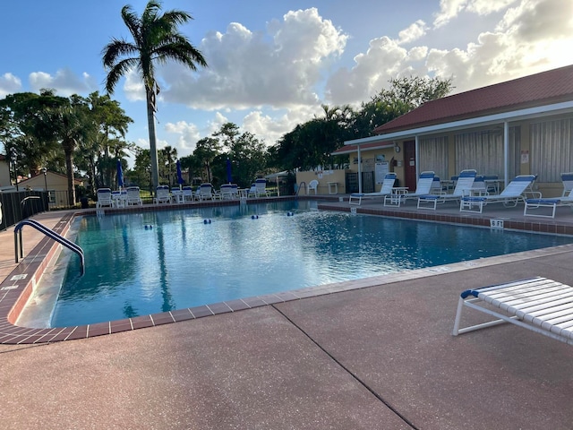 view of swimming pool featuring a patio